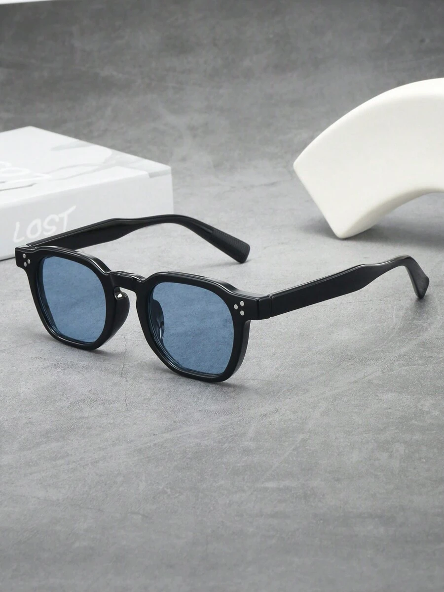 Ovale zonnebril zwart frame blauw lens