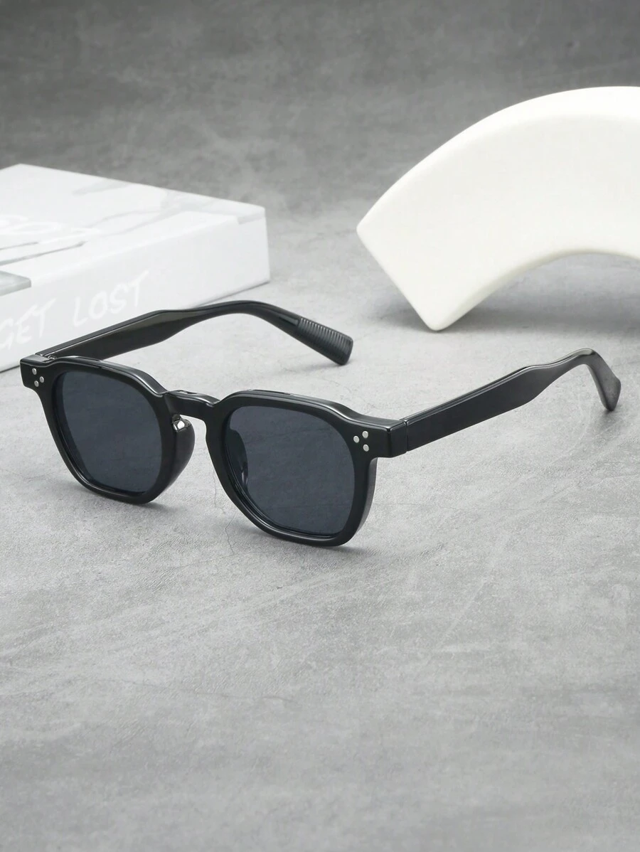 Ovale zonnebril zwart frame grijs lens