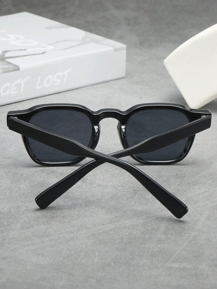 Ovale zonnebril zwart frame grijs lens