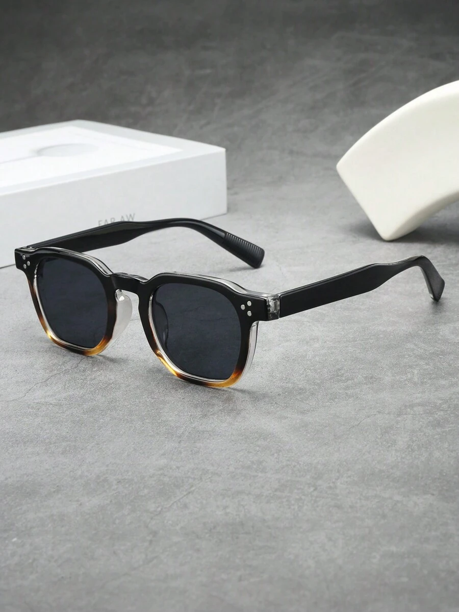 Ovale zonnebril zwart frame grijs lens