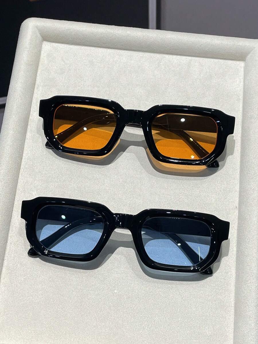 Retro vierkante zonnebril zwart frame oranje lens